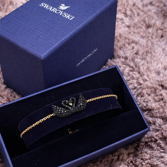 SWAROVSKI Pulsera Iconic Swan Oro Rosa Y Negro + Regalo