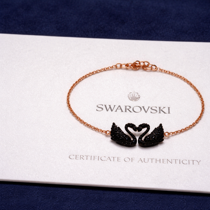 SWAROVSKI Pulsera Iconic Swan Oro Rosa Y Negro + Regalo
